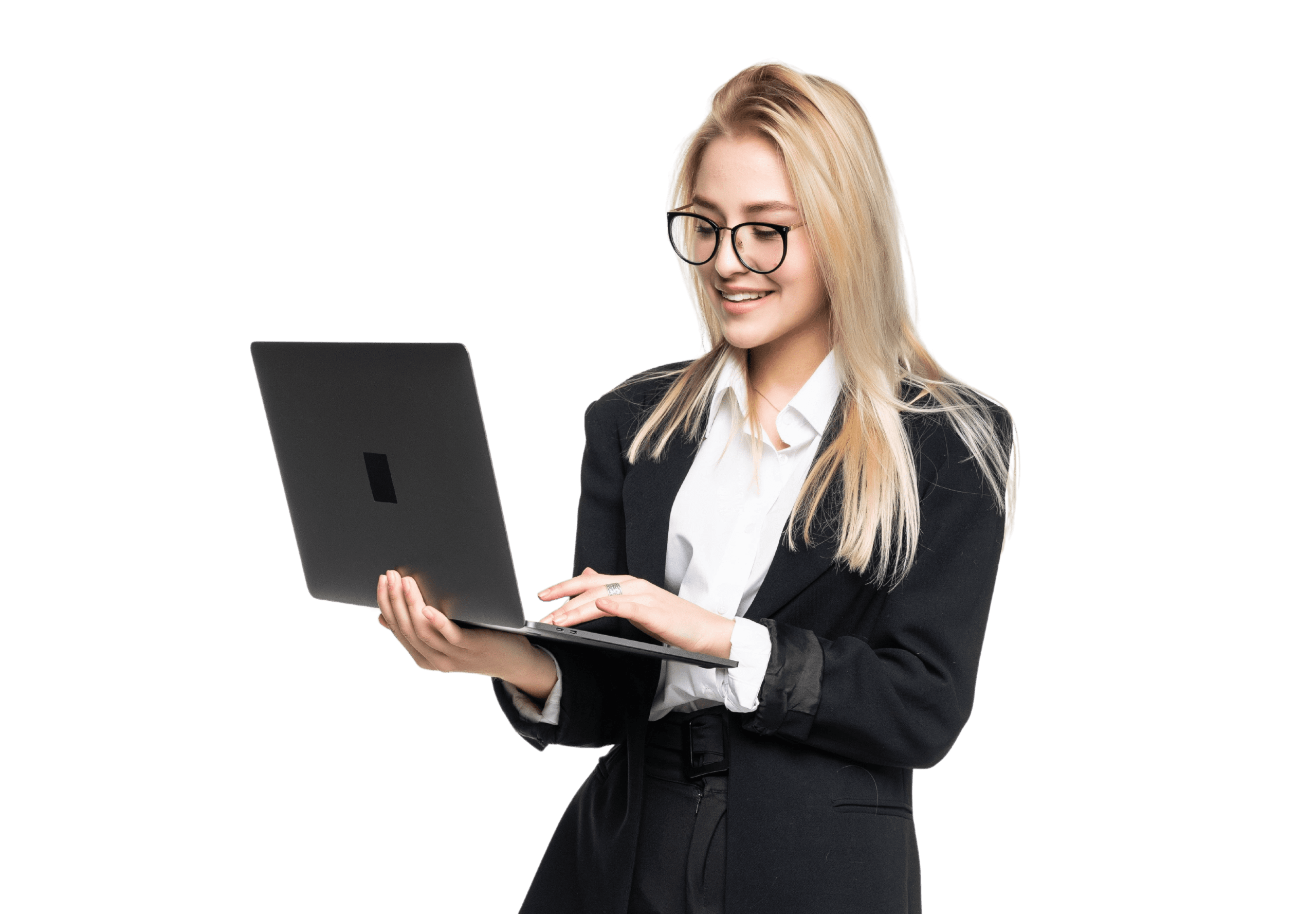 Young female worker holding and looking at laptop while smiling.